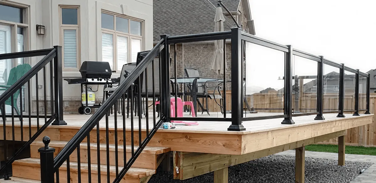 Handrail installation on a deck staircase for safety and code compliance in Marietta, GA