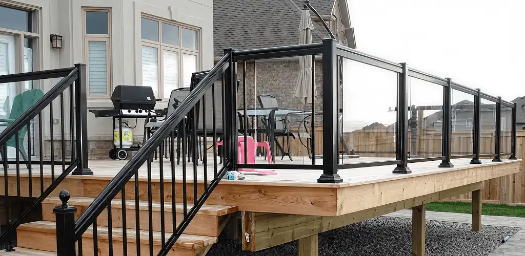 Handrail installation on a deck staircase for safety and code compliance in Marietta, GA